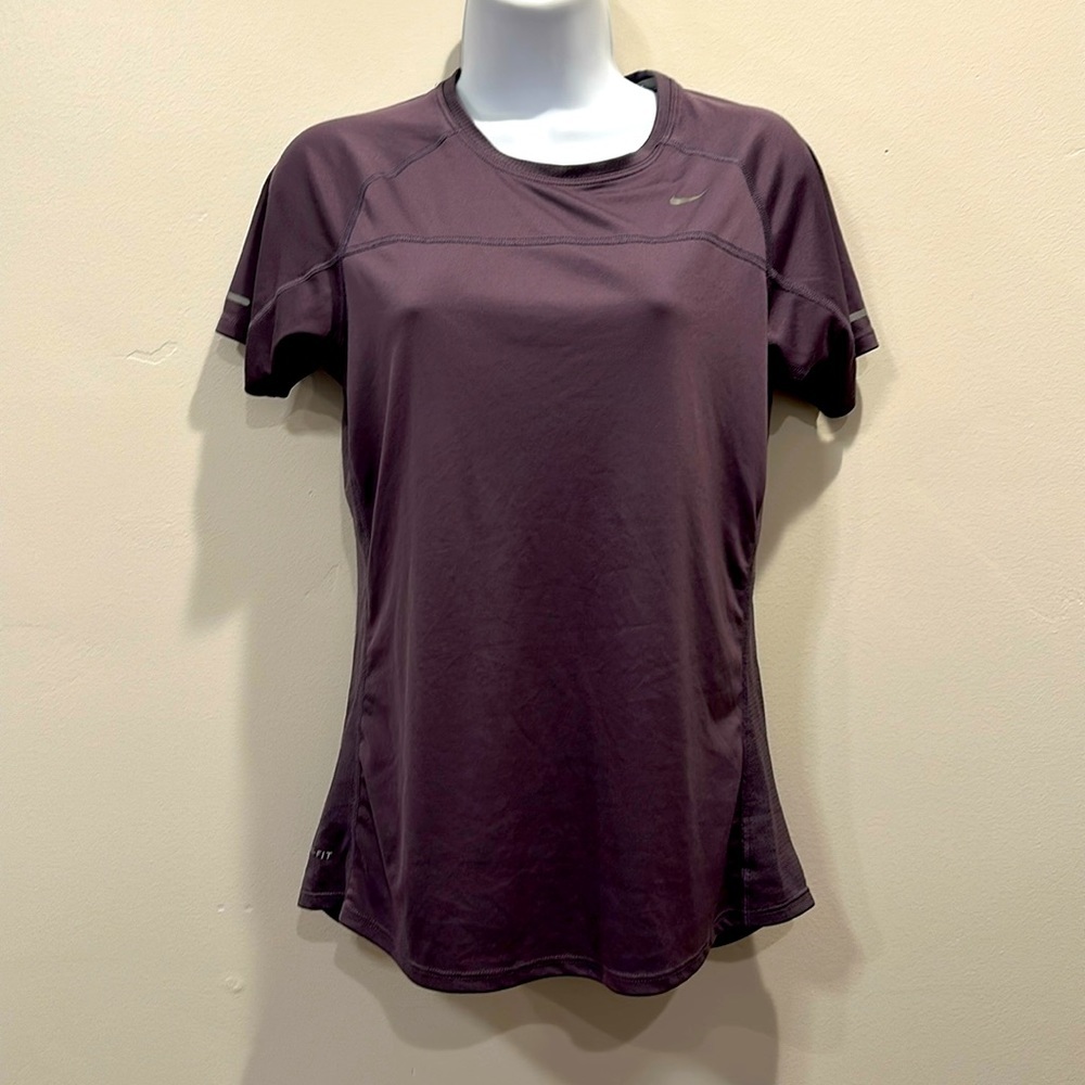Nike Dri-fit. Size M. Workout shirt. Purple. Good condition.